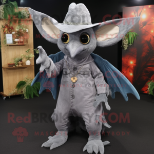 Silver Fruit Bat mascot costume character dressed with a Bootcut Jeans and Hat pins