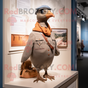 Tan Passenger Pigeon mascot costume character dressed with a Henley Tee and Mittens