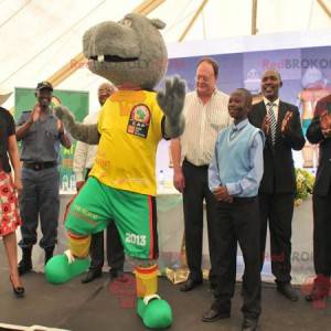 Gray hippopotamus mascot in yellow and green outfit -