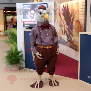 Maroon Guinea Fowl mascot costume character dressed with a Oxford Shirt and Anklets