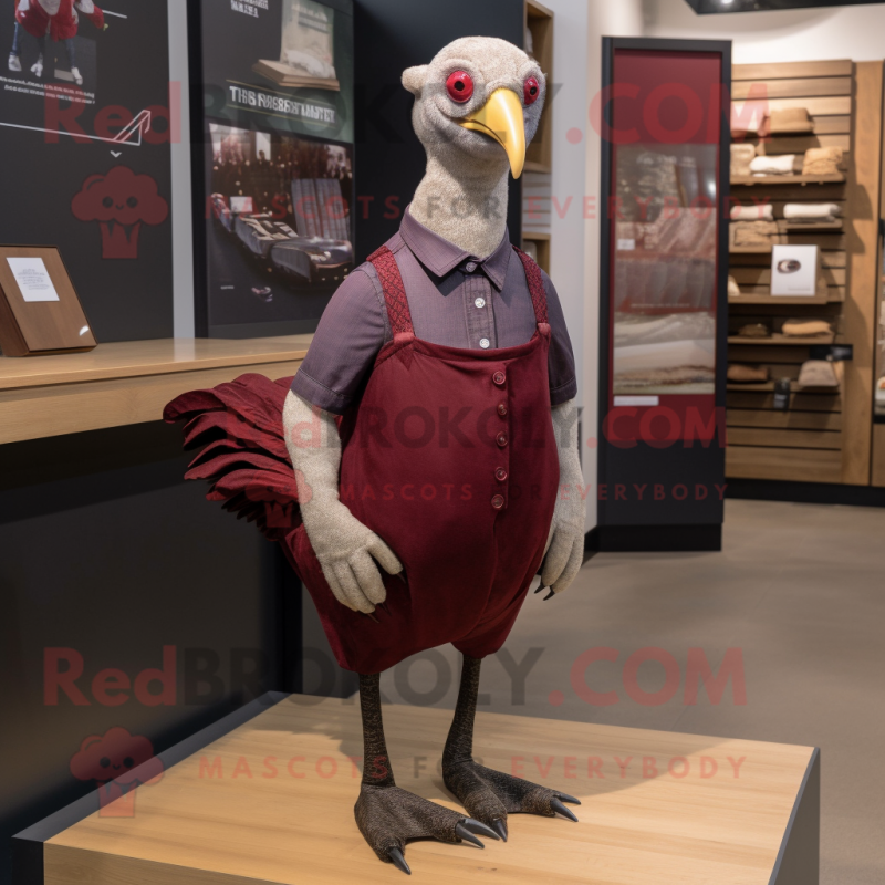 Maroon Guinea Fowl mascot costume character dressed with a Oxford Shirt and Anklets Maroon Guinea Fowl mascot costume character dressed with a Oxford Shirt and Anklets