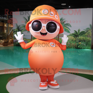 Peach Golf Ball mascot costume character dressed with a Swimwear and Rings