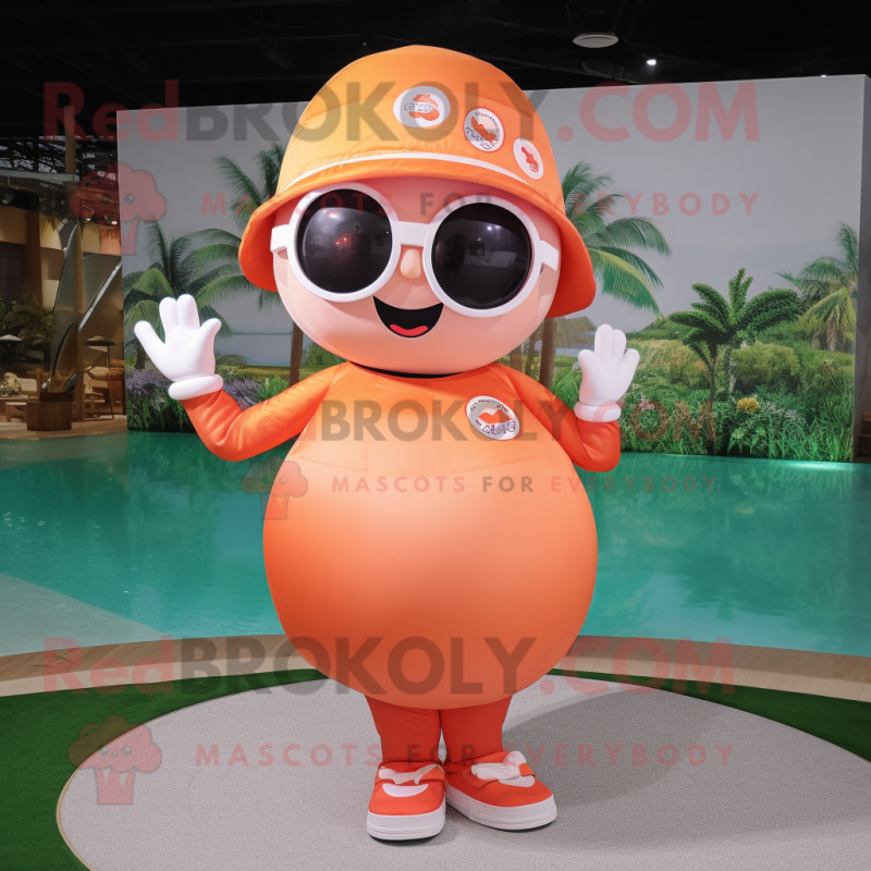 Peach Golf Ball mascot costume character dressed with a Swimwear and Rings Peach Golf Ball mascot costume character dressed with a Swimwear and Rings