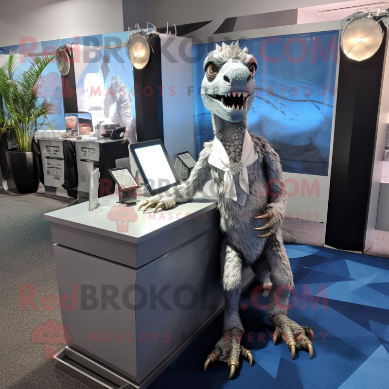 Silver Deinonychus mascot costume character dressed with a Skirt and Ties Silver Deinonychus mascot costume character dressed with a Skirt and Ties
