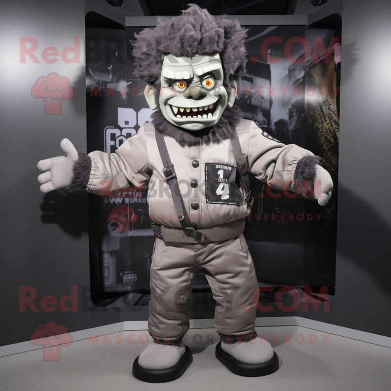 Gray Frankenstein mascot costume character dressed with a Bomber Jacket and Headbands Gray Frankenstein mascot costume character dressed with a Bomber Jacket and Headbands