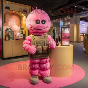 Pink Grenade mascot costume character dressed with a Playsuit and Shawls