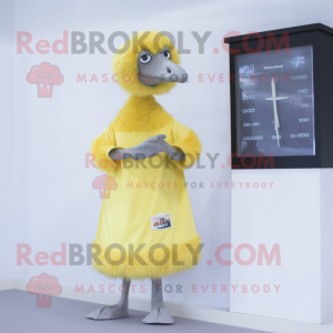 Yellow Ostrich mascot costume character dressed with a A-Line Skirt and Digital watches