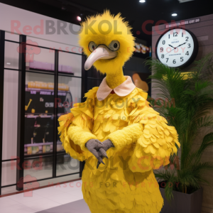 Yellow Ostrich mascot costume character dressed with a A-Line Skirt and Digital watches