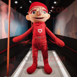 Red Tightrope Walker mascot costume character dressed with a Vest and Scarves