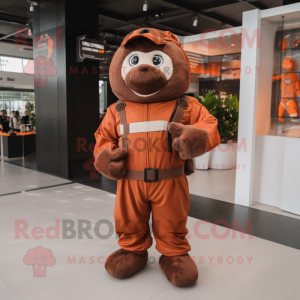 Brown Apricot mascot costume character dressed with a Jumpsuit and Belts