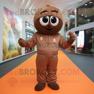 Brown Apricot mascot costume character dressed with a Jumpsuit and Belts