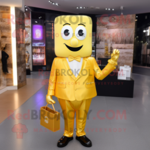 Gold Scented Candle mascot costume character dressed with a Suit Pants and Messenger bags