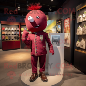 Maroon Grenade mascot costume character dressed with a Henley Shirt and Lapel pins
