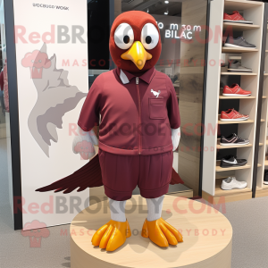 Maroon Pigeon mascot costume character dressed with a Playsuit and Shoe laces