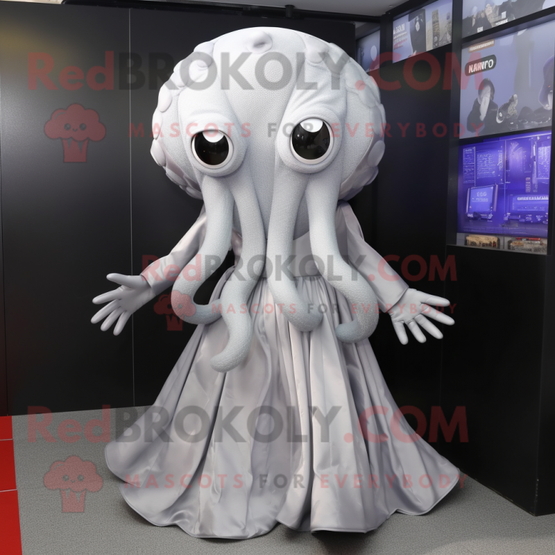 Silver Octopus mascot costume character dressed with a Pleated Skirt and Suspenders Silver Octopus mascot costume character dressed with a Pleated Skirt and Suspenders