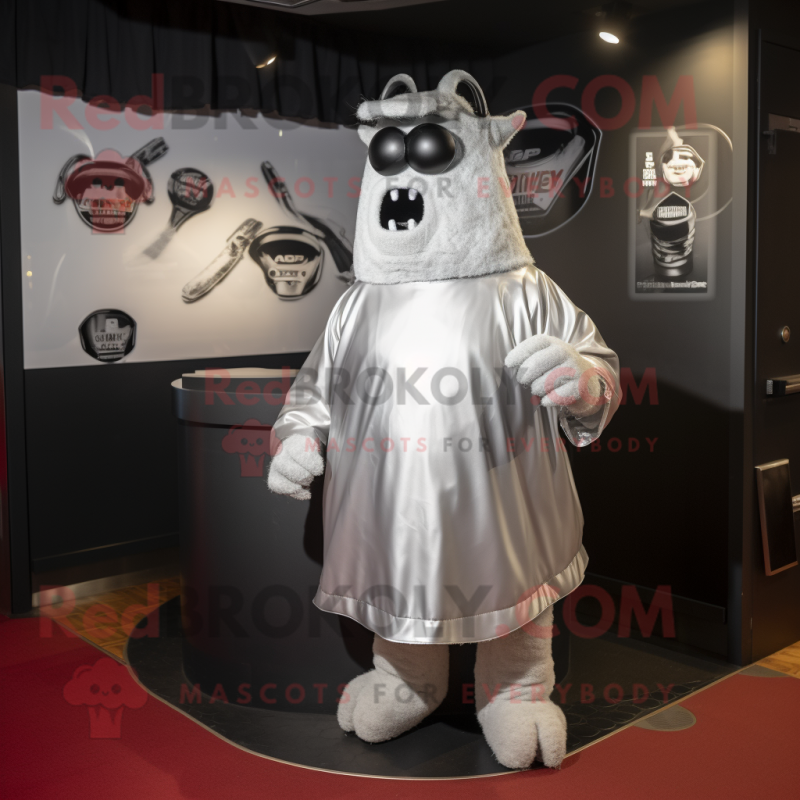 Silver Steak mascot costume character dressed with a Cover-up and Watches