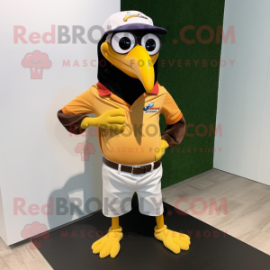 Gold Toucan mascot costume character dressed with a Oxford Shirt and Eyeglasses