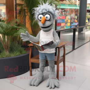 Gray Paella mascot costume character dressed with a Jeans and Reading glasses