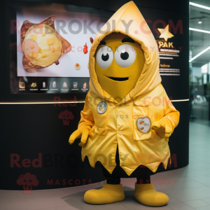 Gold Shakshuka mascot costume character dressed with a Parka and Lapel pins