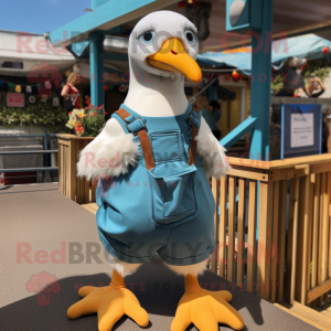 Turquoise Seagull mascot costume character dressed with a Dungarees and Shoe clips