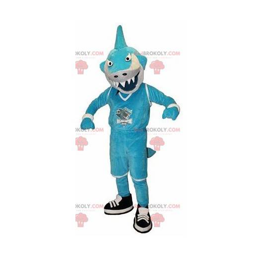 Mascote tubarão azul e branco parecendo feroz - Redbrokoly.com