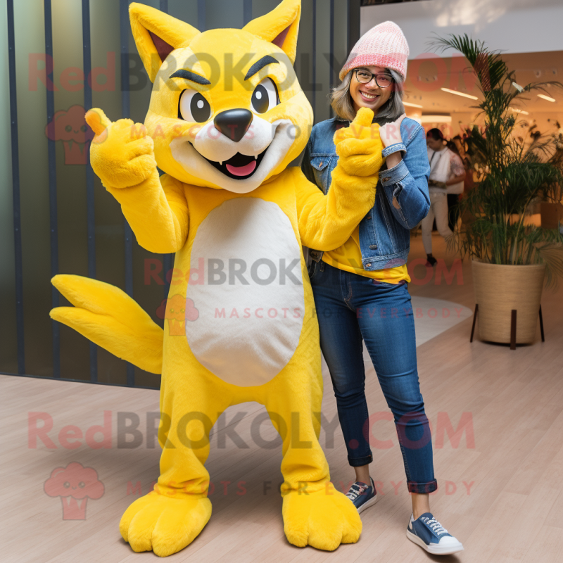 Yellow Wolf mascot costume character dressed with a Boyfriend Jeans and Wraps