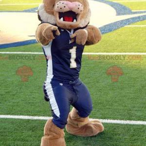 Mascota de tigre león marrón en ropa deportiva azul -