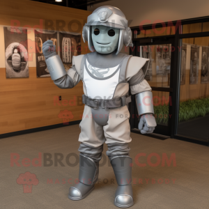 Silver Spartan Soldier mascot costume character dressed with a Baseball Tee and Suspenders