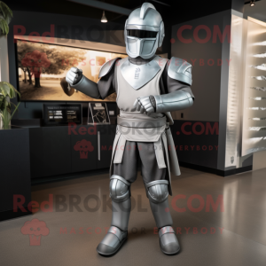 Silver Spartan Soldier mascot costume character dressed with a Baseball Tee and Suspenders