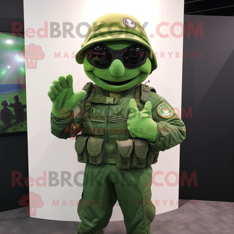 Green Green Beret mascot costume character dressed with a T-Shirt and Gloves