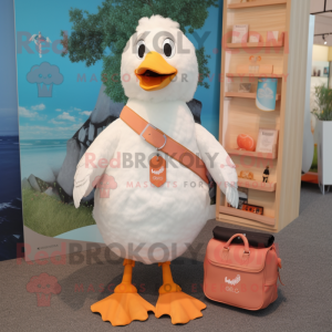 Peach Seagull mascot costume character dressed with a V-Neck Tee and Messenger bags