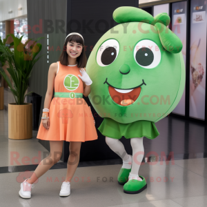Peach Spinach mascot costume character dressed with a Mini Skirt and Smartwatches