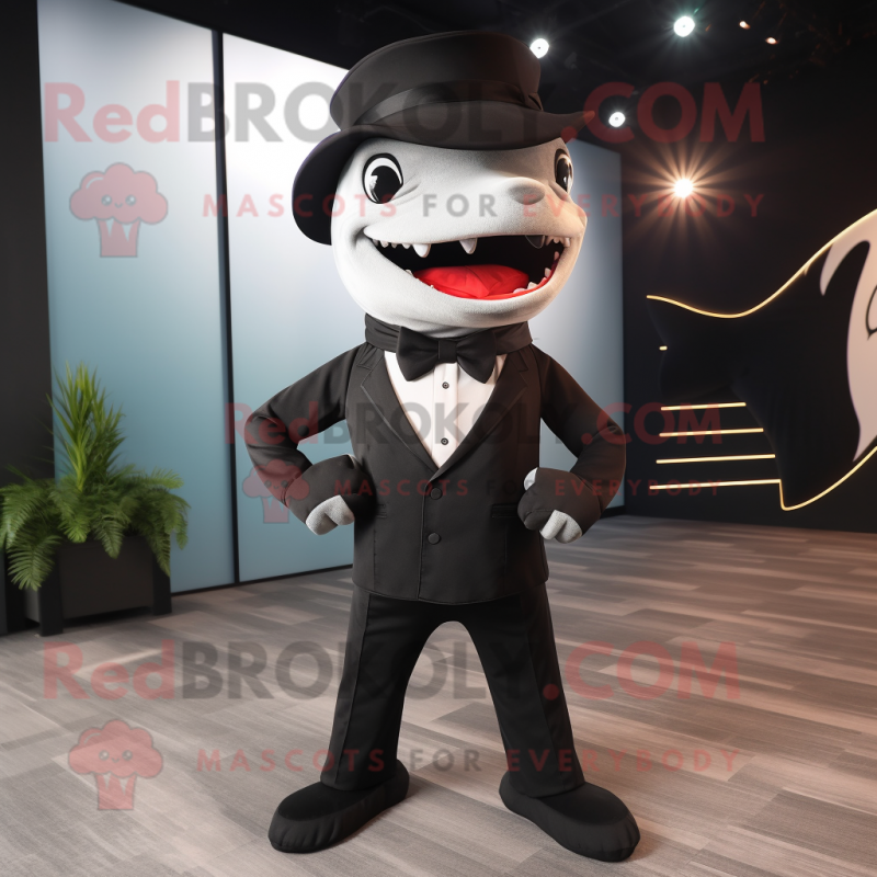 Black Shark mascot costume character dressed with a Tuxedo and Beanies Black Shark mascot costume character dressed with a Tuxedo and Beanies