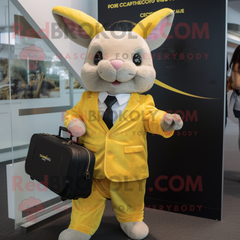 Yellow Chinchilla mascot costume character dressed with a Suit Pants and Briefcases