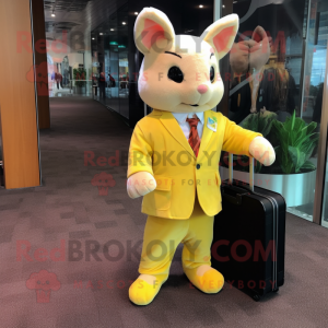 Yellow Chinchilla mascot costume character dressed with a Suit Pants and Briefcases