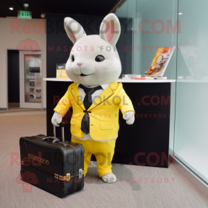 Yellow Chinchilla mascot costume character dressed with a Suit Pants and Briefcases