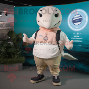 Beige Humpback Whale mascot costume character dressed with a Rash Guard and Smartwatches