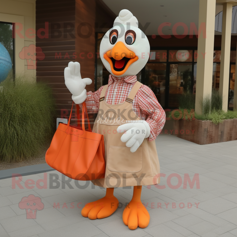 Peach Turkey mascot costume character dressed with a Dress Shirt and Tote bags