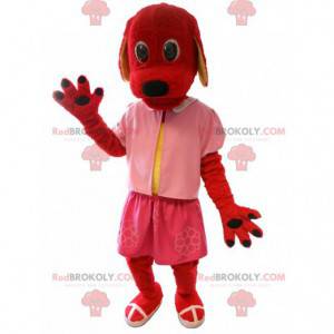 Maskot červený pes oblečený v růžové barvě. Kostým pro psa -