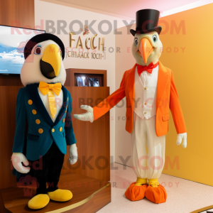 Peach Macaw mascot costume character dressed with a Tuxedo and Watches