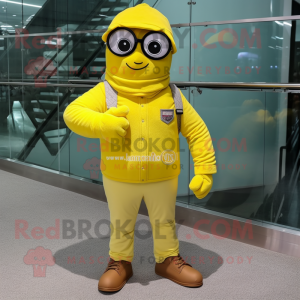 Lemon Yellow Commando mascot costume character dressed with a Corduroy Pants and Eyeglasses