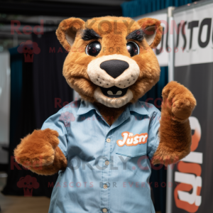 Rust Jaguarundi mascot costume character dressed with a Poplin Shirt and Hair clips