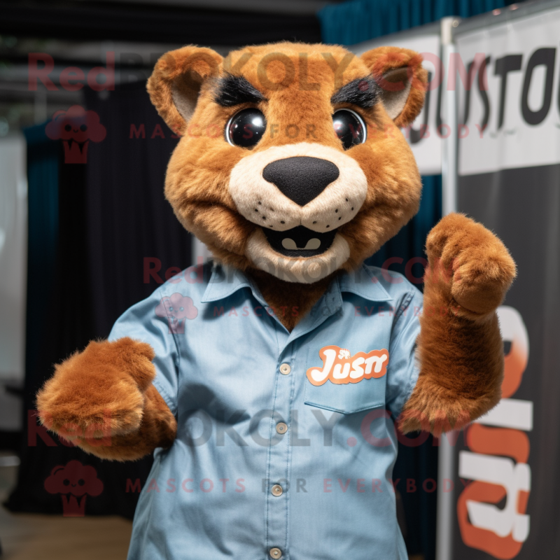 Rust Jaguarundi mascot costume character dressed with a Poplin Shirt and Hair clips Rust Jaguarundi mascot costume character dressed with a Poplin Shirt and Hair clips