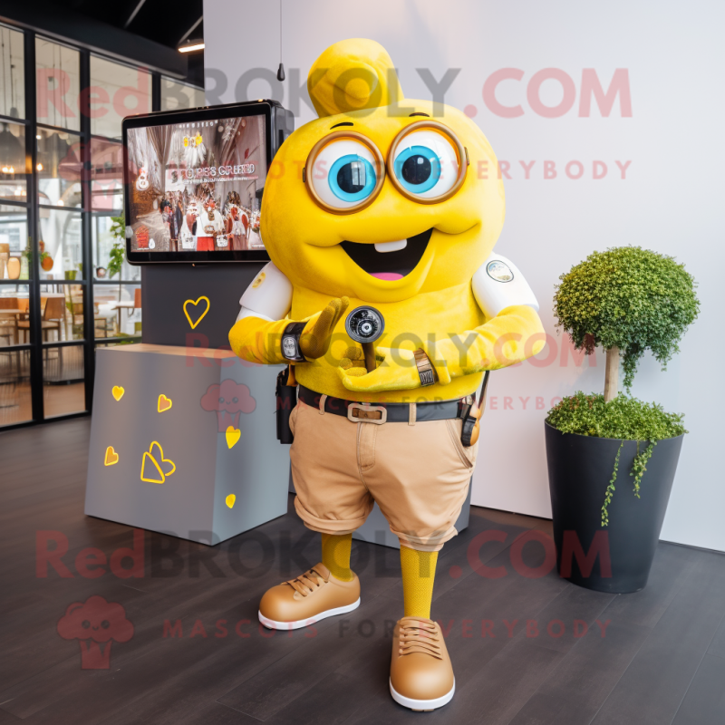 Gold Heart mascot costume character dressed with a Boyfriend Jeans and Smartwatches Gold Heart mascot costume character dressed with a Boyfriend Jeans and Smartwatches