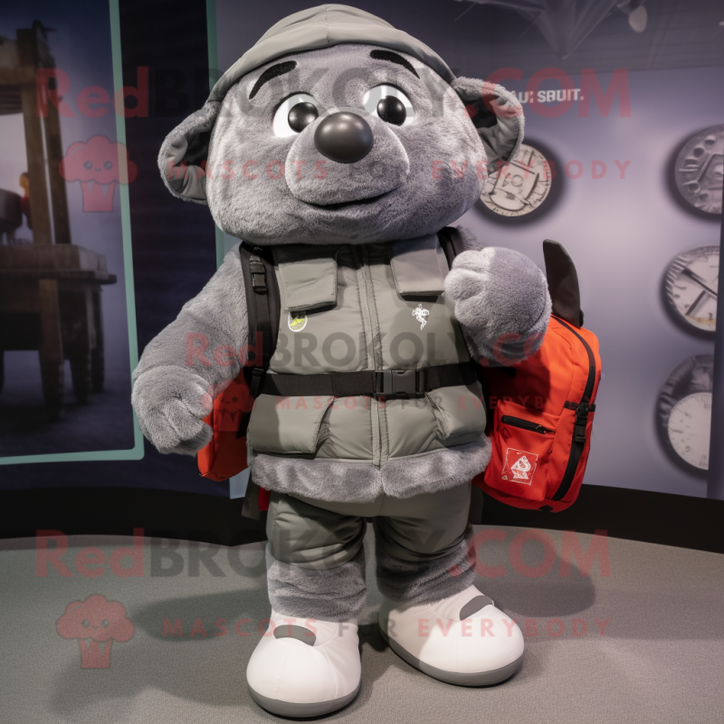 Gray Squash mascot costume character dressed with a Bomber Jacket and Backpacks Gray Squash mascot costume character dressed with a Bomber Jacket and Backpacks