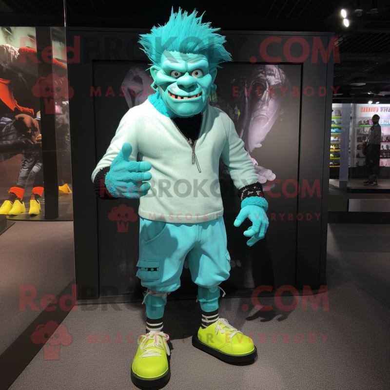 Turquoise Frankenstein mascot costume character dressed with a Joggers and Shoe laces