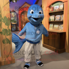 Blue Salmon mascot costume character dressed with a Long Sleeve Tee and Suspenders