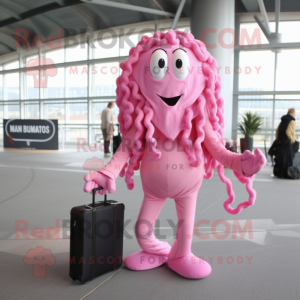 Pink Medusa mascot costume character dressed with a Suit Pants and Briefcases