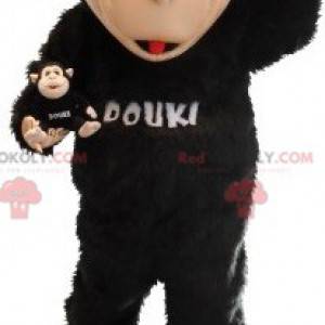 Mascotte scimmia nera e beige. Mascotte Douki - Redbrokoly.com