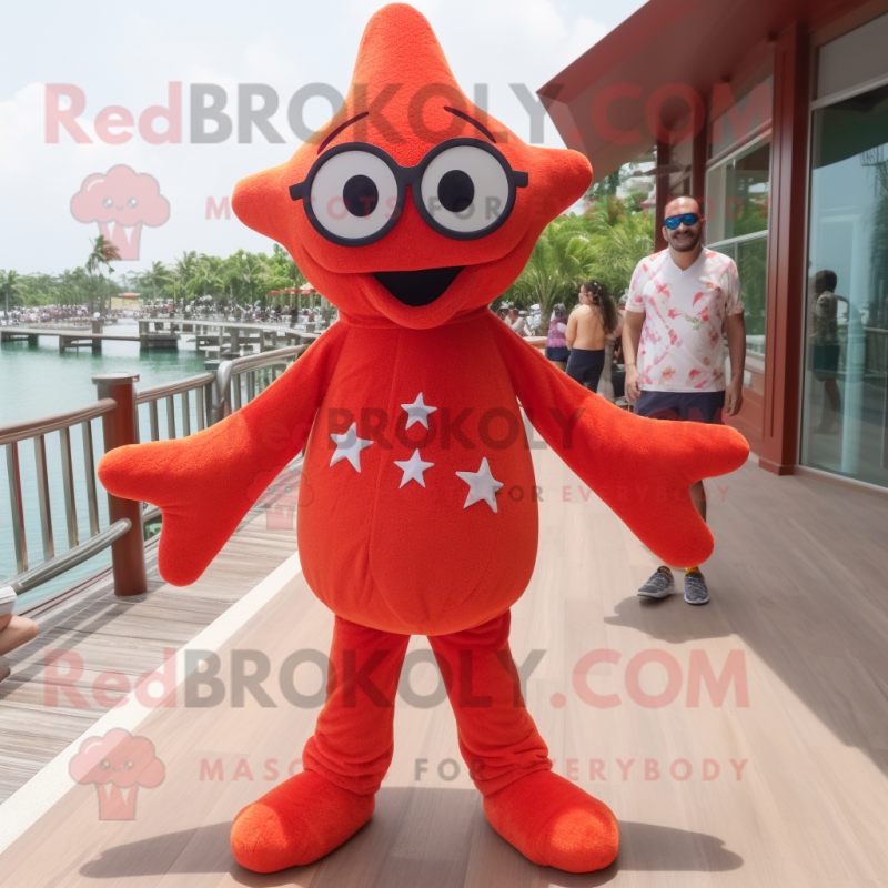 Red Starfish mascot costume character dressed with a Henley Shirt and Eyeglasses